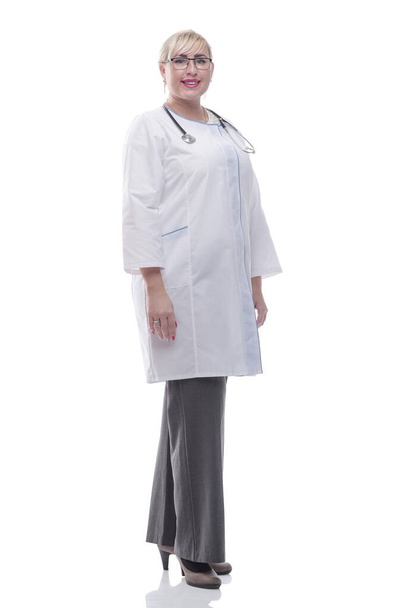 friendly female doctor showing thumbs up . isolated on a white - Fotografie, Obrázek