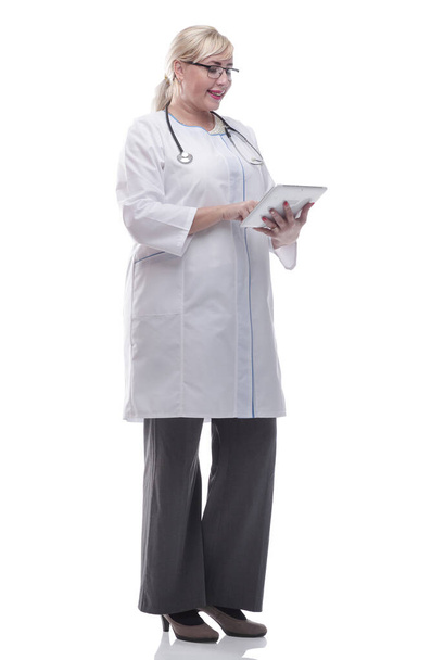 smiling woman doctor with a digital tablet. isolated on a white - Foto, immagini