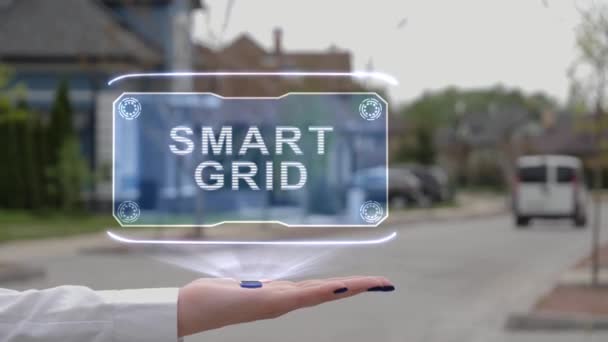 Mão feminina mostrando holograma Smart Grid - Filmagem, Vídeo