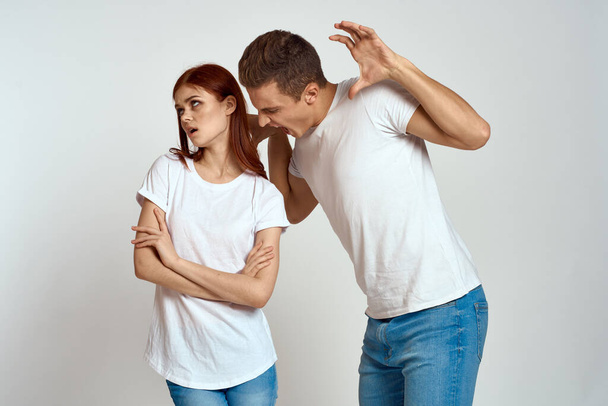 family couple in love jeans white t-shirt emotions fun man and woman having fun  - 写真・画像