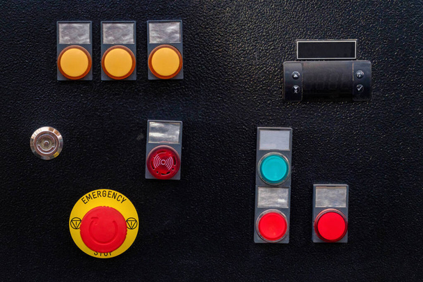 Industrial control panel at factory with yellow and red buttons - Photo, Image