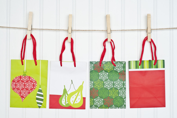 Holiday Gift Bags on a Clothesline - Photo, Image