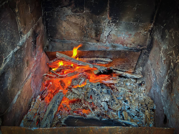 Dying coals in an old stone stove - Photo, Image