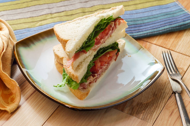 BLT Bacon lettuce and tomato club sandwich on rye bread untoasted - Photo, Image