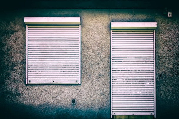 Closed shutters in a frightening house. - Photo, Image