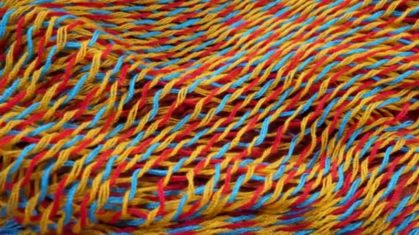 Struttura variopinta di tessuto lavorato a maglia - Filmati, video