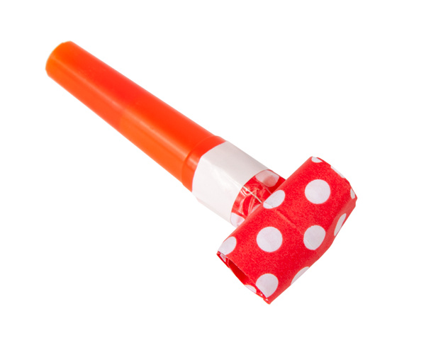 Rolled festive noisemaker or party whistle horn on the white - Photo, Image