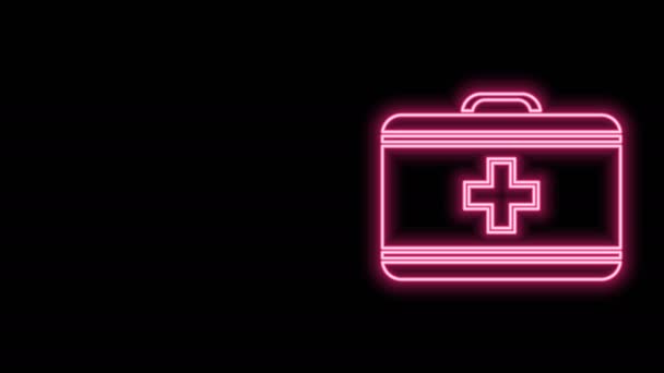 Gloeiende neon lijn EHBO kit icoon geïsoleerd op zwarte achtergrond. Medische doos met kruis. Medische apparatuur voor noodgevallen. Gezondheidszorg concept. 4K Video motion grafische animatie - Video