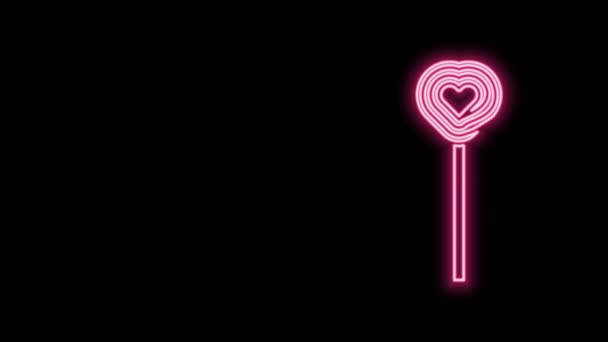 Świecąca neonowa ikona lizaka odizolowana na czarnym tle. Znak słodyczy. Jedzenie, pyszny symbol. Walentynki. Symbol miłości. 4K Animacja graficzna ruchu wideo - Materiał filmowy, wideo