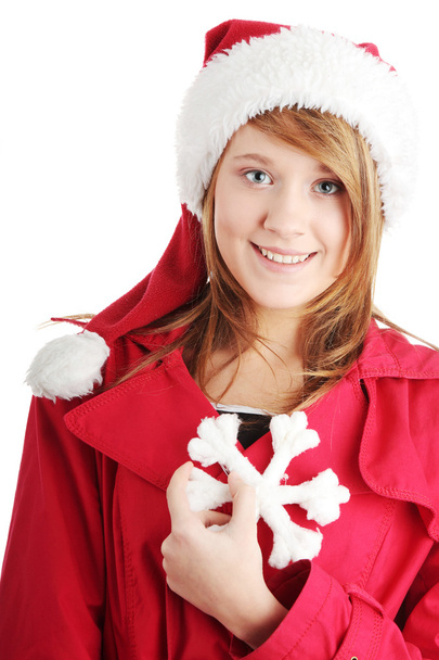 Christmas teen girl in santa hat - 写真・画像
