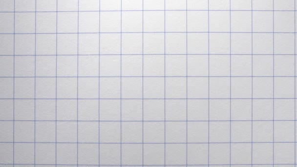 Oefenboekje in een kooi. Schoolschrift. Een wit veld met een geometrisch patroon. - Video