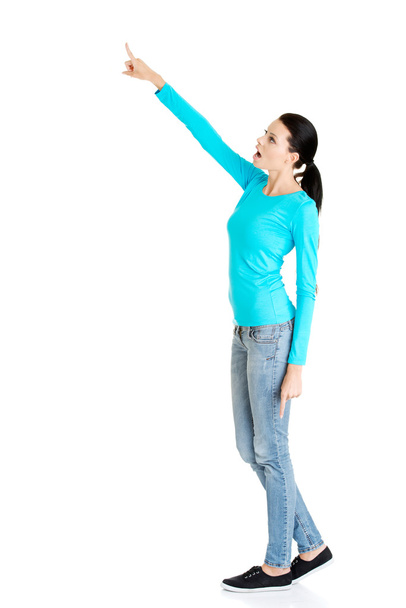 Woman pointing on copy space - Фото, зображення