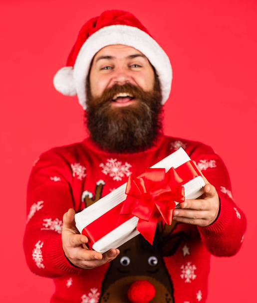 Open present. Christmas gift. Boxing day. Keep calm and winter on. Prosperity and wellbeing. Shopping concept. Santa Claus bearded man. Merry Christmas. Christmas surprise tradition. Spreading warmth - Foto, immagini