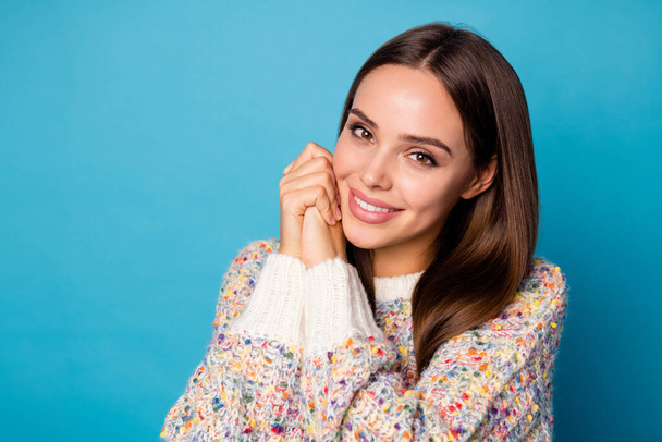 Closeup photo of attractive pretty lady good mood hold arms near cheek overjoyed appreciate boyfriend surprise wear casual sweater isolated blue color background - Fotó, kép