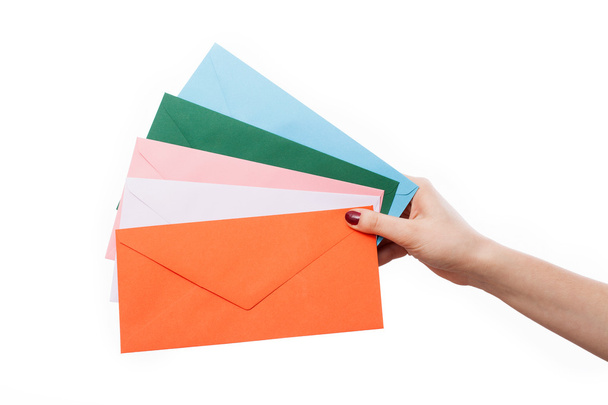 Hand with colourful envelopes - Fotoğraf, Görsel