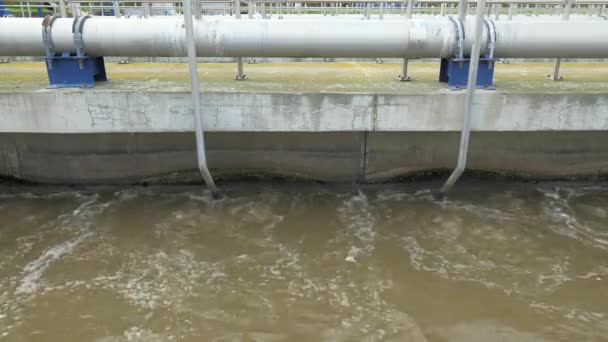 Wastewater swirl to separate fine sand and small mechanical impurities. The first sedimentation step. Modern sewage or wastewater treatment plant - Footage, Video
