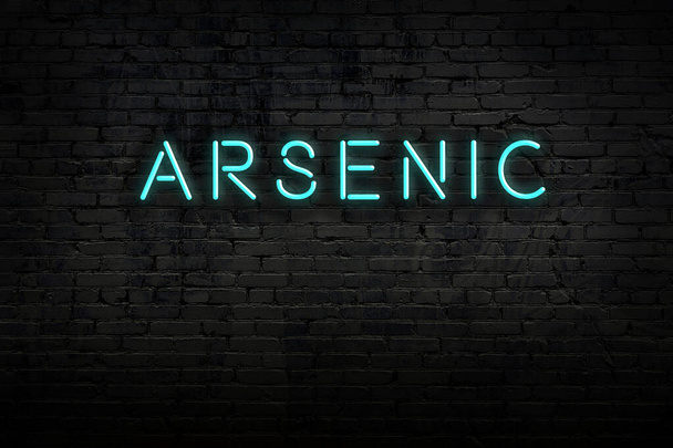 Night view of neon sign on brick wall with inscription arsenic - Photo, Image