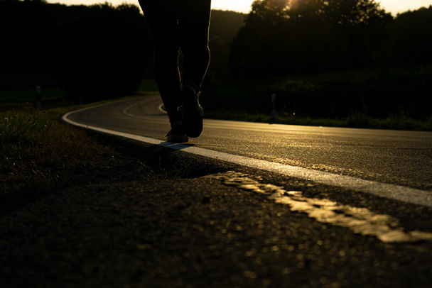 walking on highway in the twilight - Foto, afbeelding