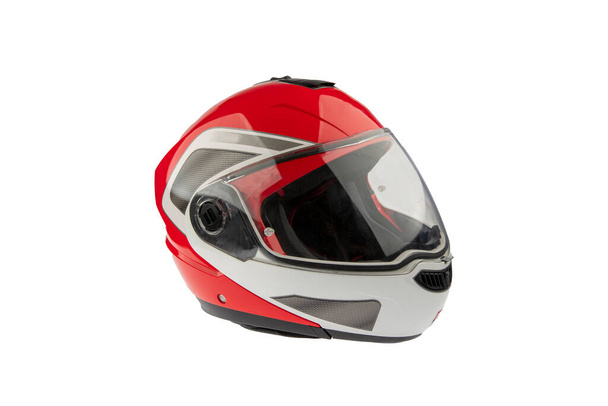 Мотоциклетный шлем над изолировать на белом фоне. - Фото, изображение