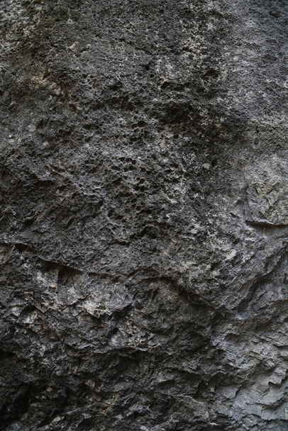 The texture of the rock. Mountain cliff of rock surface.  Natural cave wall. - Photo, Image