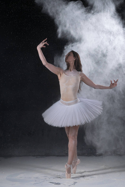 beautiful ballerina dancing in white flour - Φωτογραφία, εικόνα