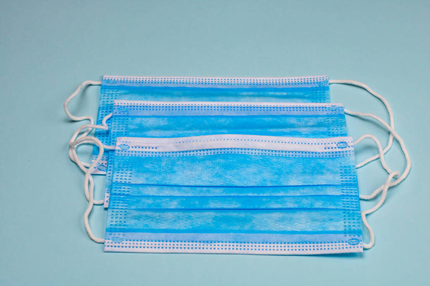 Close up and detail of medical hygienic mask, face protective surgical masks isolated. - Photo, Image