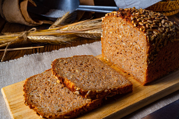 Moist wholemeal bread, crushed or ground whole grain - Fotó, kép