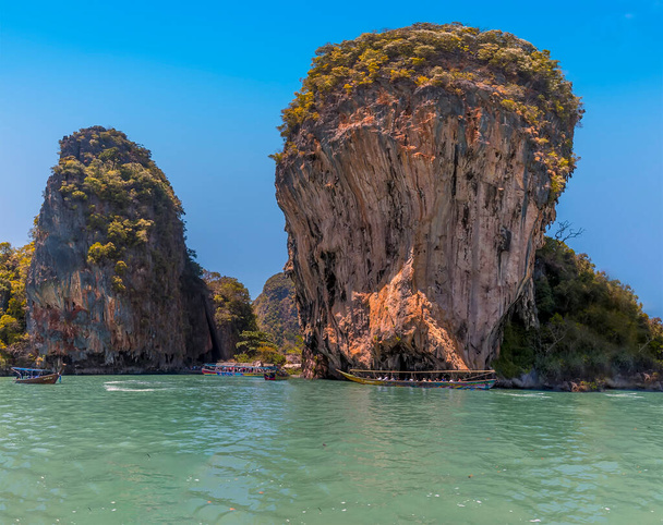 A view in Phang Nga Bay of the seaward side of Khao Phing Kan island in Thailand - Photo, image