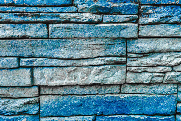 Colorful brick wall pattern from blue stones - Zdjęcie, obraz