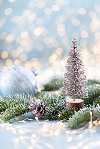 Christmas spruce with tree and blurred shiny lights. - Zdjęcie, obraz