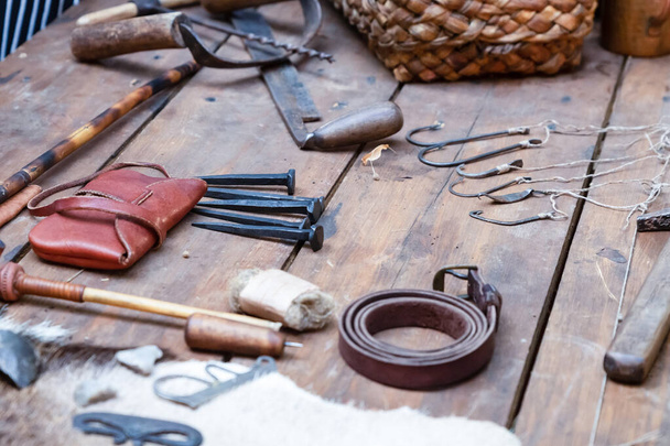 leather craftsmen's table belts, bag and tools for work - Photo, Image