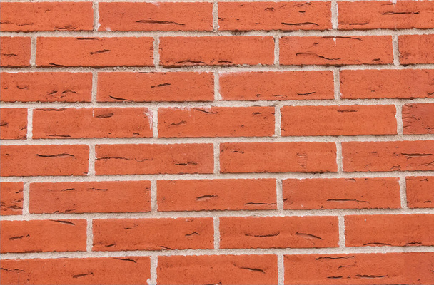 brick wall red grunge background with gray lines joints - Valokuva, kuva