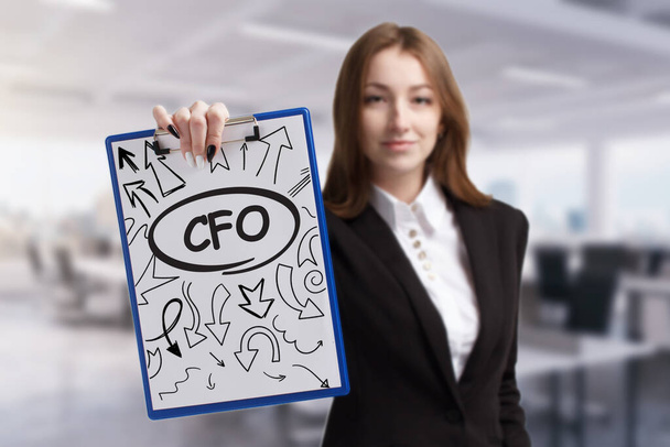 Business, technology, internet and network concept. Young businessman thinks over the steps for successful growth: CFO - Photo, image