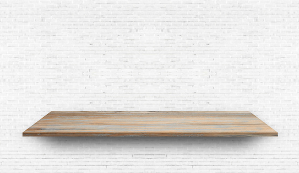 Empty wood plank shelf at white brick wall pattern background. Design for product display, mockup, advertise, banner, or montage - Photo, Image