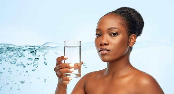 young african american woman with glass of water - Fotografie, Obrázek