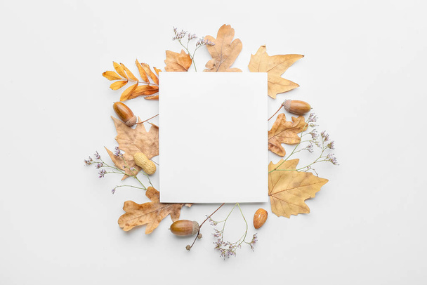 Beautiful autumn composition with empty card on white background - Foto, immagini