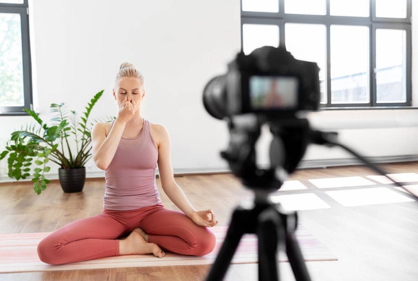 woman or blogger recording gym yoga class video - Foto, Imagen