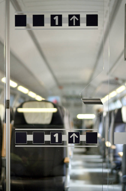 Train compartment in one train with glass door to the first class - Photo, Image