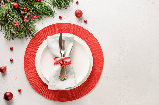 Christmas festive table setting with white and red holiday elegant decorations on white table. Top view. Space for text. - Φωτογραφία, εικόνα