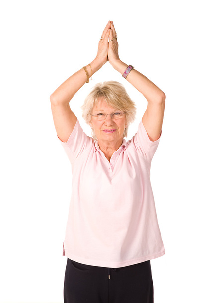 zralá žena v pozici jóga - Fotografie, Obrázek
