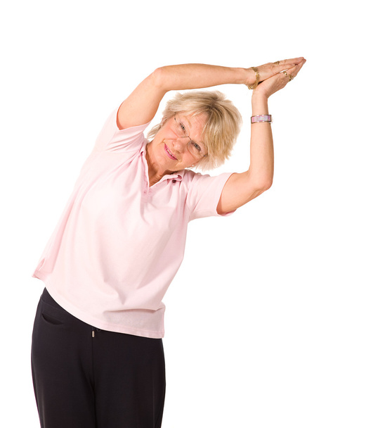 Mature woman in yoga position - Foto, Imagen