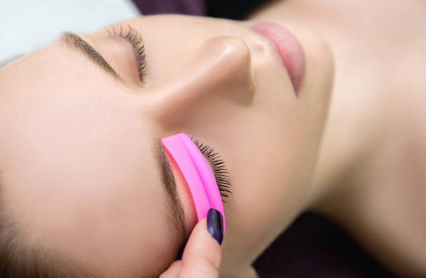 Eyelash Care Treatment Procedures: Staining, Curling, Laminating and  Extension for Lashes.  Beauty Model with Perfect Fresh Skin and Long Eyelashes. Skincare, Spa and Wellness. Close up. - Foto, Bild