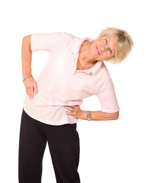 Senior lady stretching before exercise - Photo, image