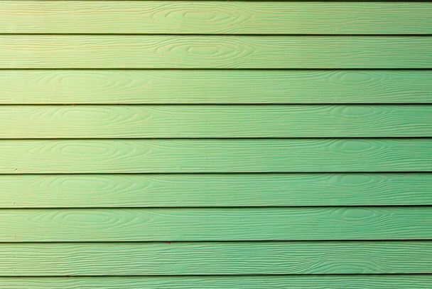 Valse groene houten muur voor abstracte achtergrond - Foto, afbeelding