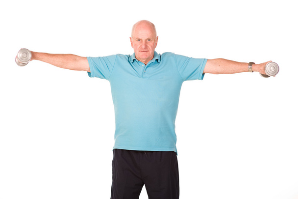 Hombre mayor levantando pesas
 - Foto, imagen