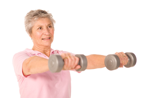 ältere Seniorin stemmt Gewichte - Foto, Bild