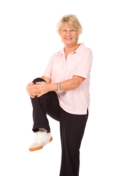Mature older lady stretching - Photo, Image