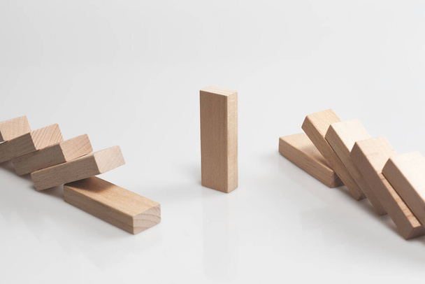 A selective focus shot of a wooden blocks stack game isolated on a white background - Photo, Image