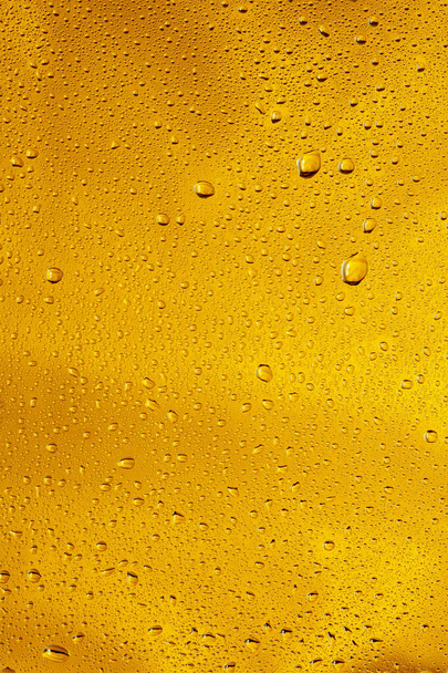 Close up view of cold drops on the glass of beer - Foto, Imagem