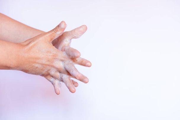 A closeup isolated shot of soapy washing hands - Valokuva, kuva